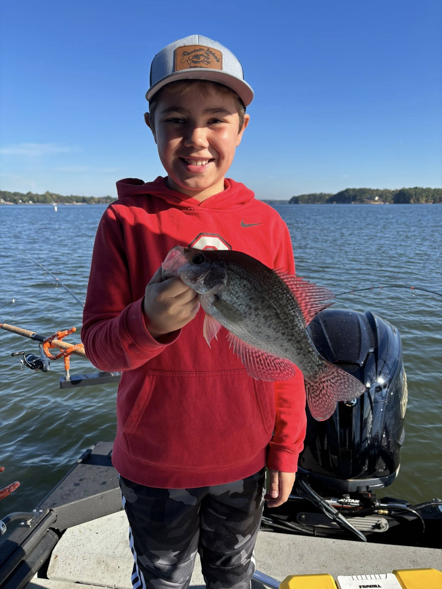 An angler holding a crappie in South Carolina