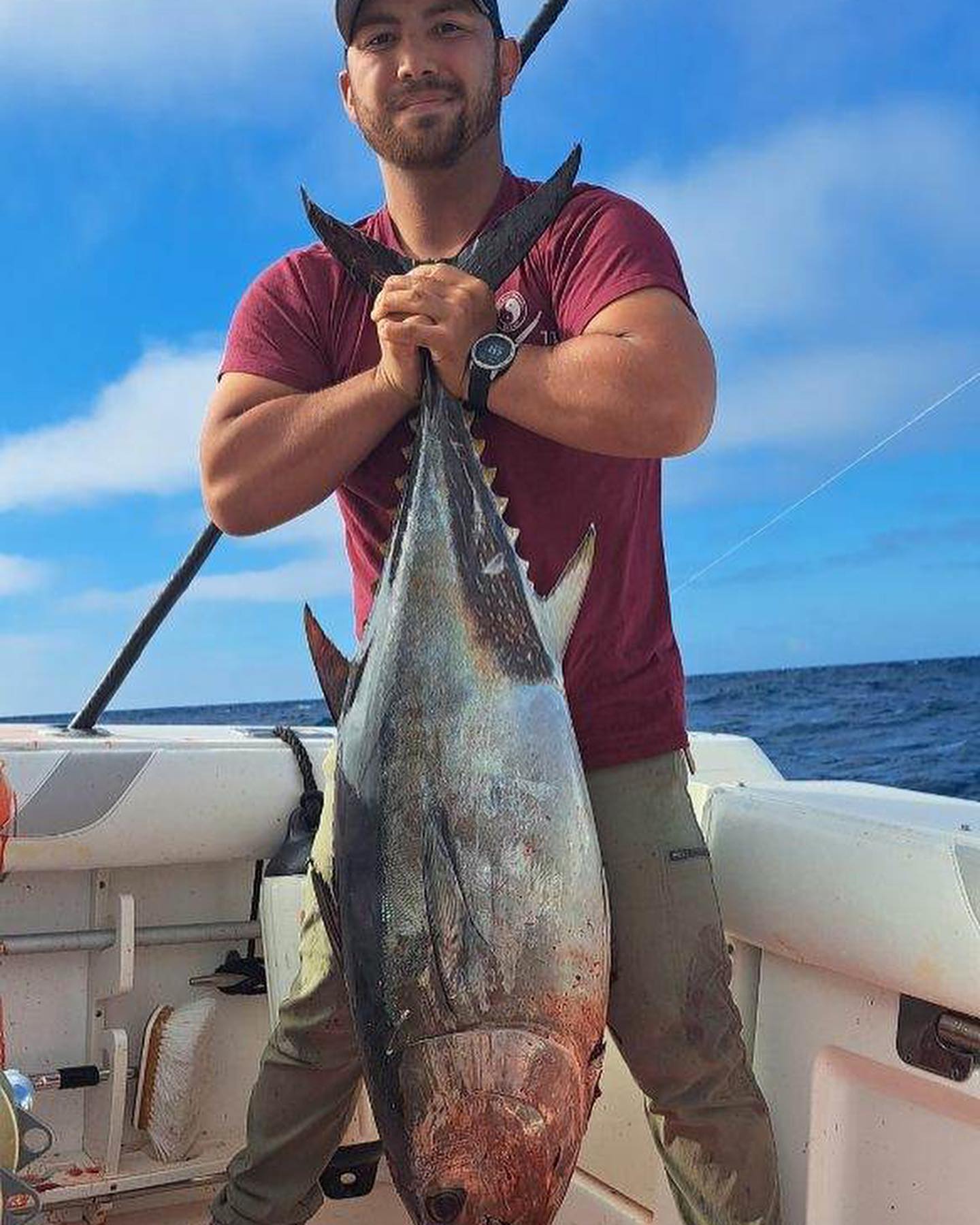 Angler posing with their catch in California