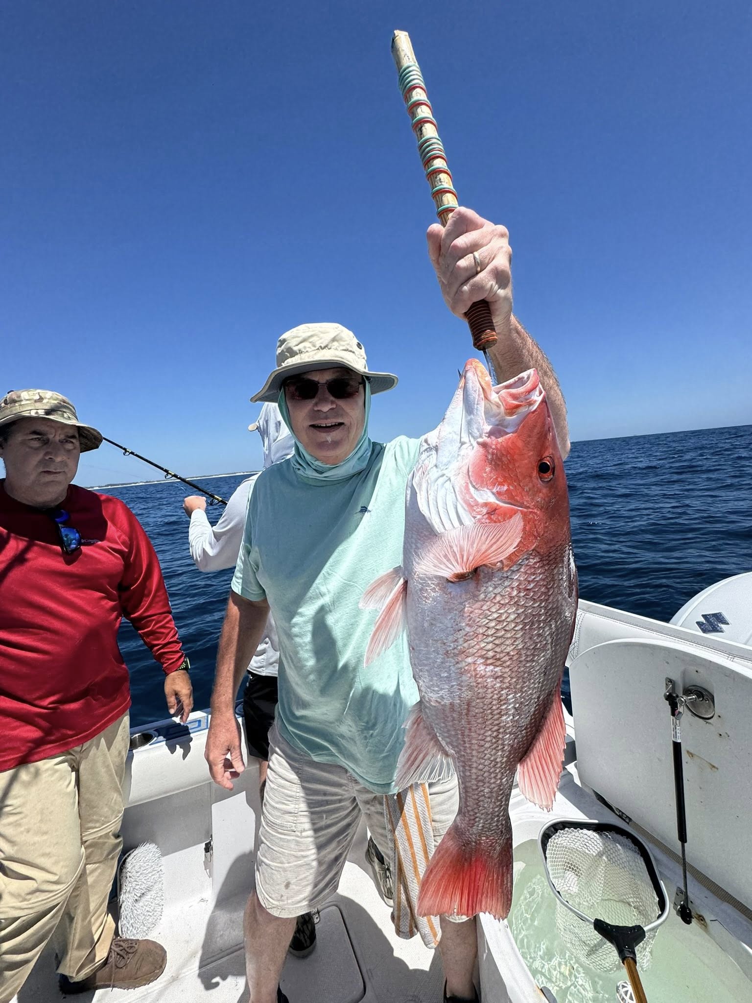 Red snapper caught while fishing in Destin FL displayed on boat deck