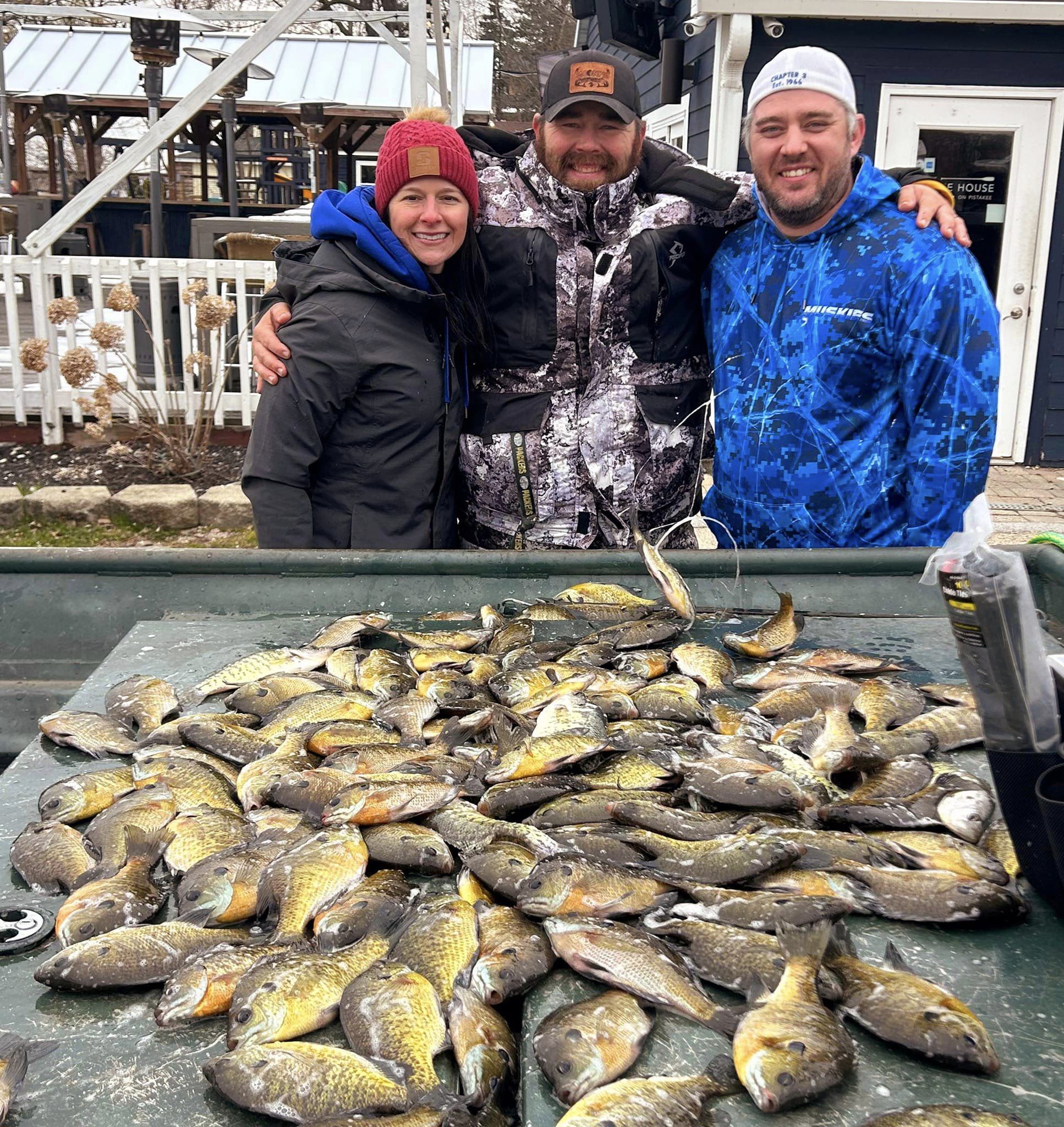 Three people fishing in East Dundee