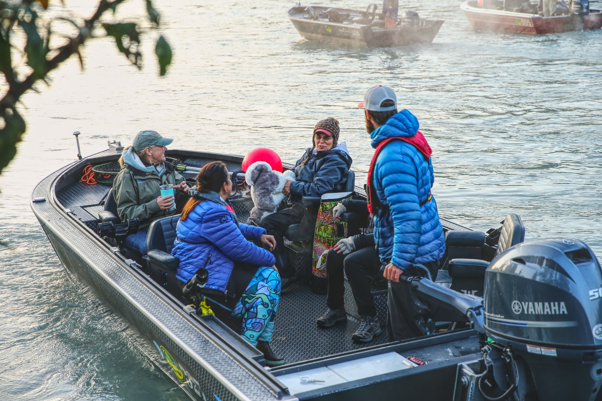 Three people fishing in Alaska