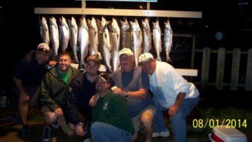 5 people fishing in Kewaunee