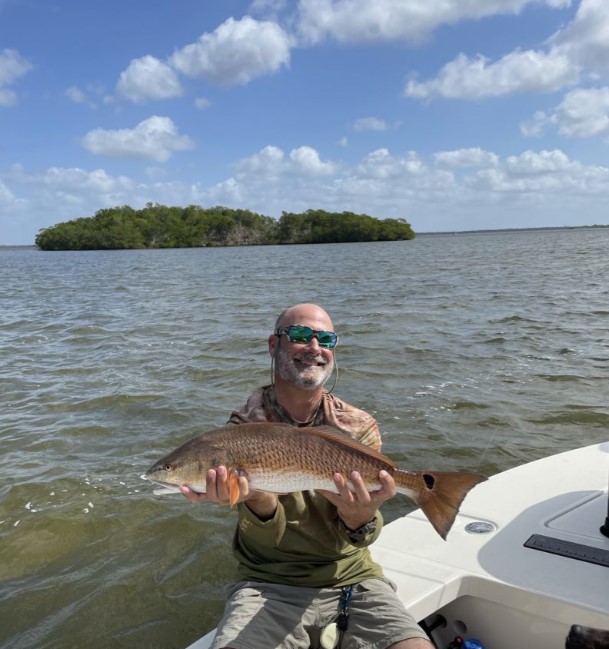 Angler catches a big redfish in Fort Myers