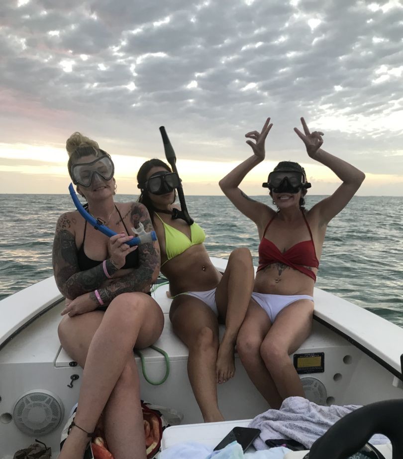 Snorkeling gear on fishing boat in Islamorada FL waters at sunset