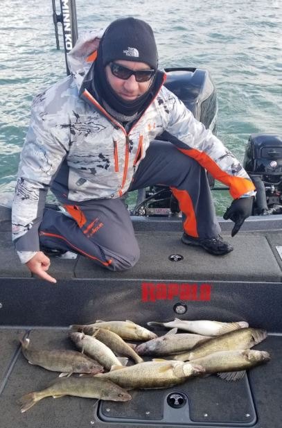 1 person holding a fishing rod in OH