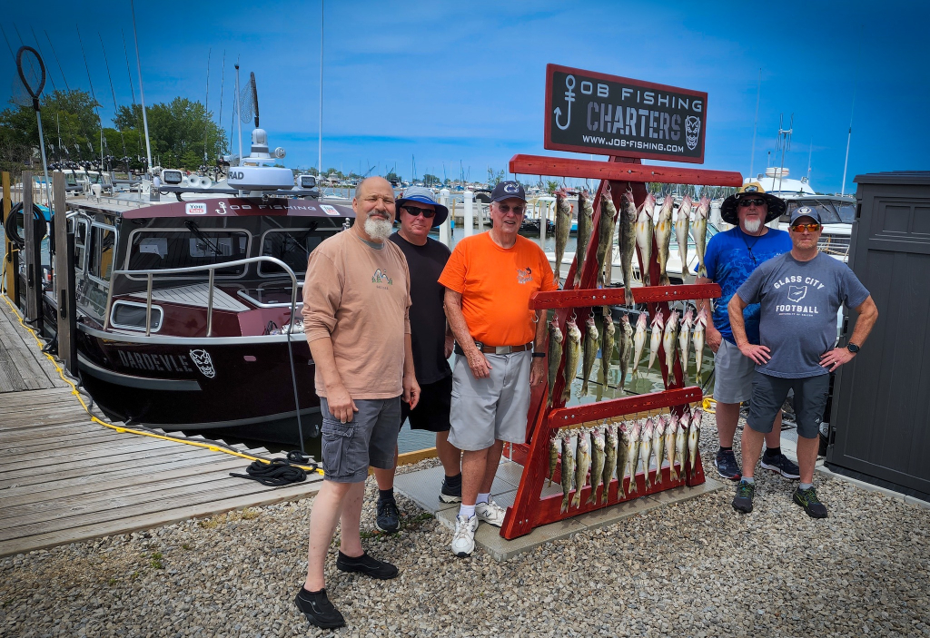Group of 5 people enjoying outdoor activity at Port Clinton