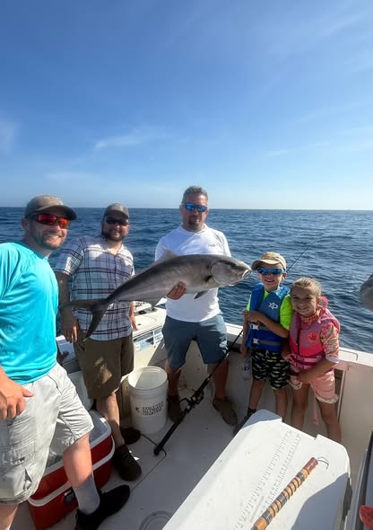 Greater amberjack caught during fishing trip in Shalimar FL on boat deck