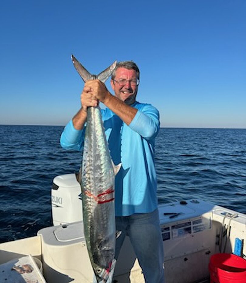 King mackerel catch displayed on fishing boat in Shalimar FL waters