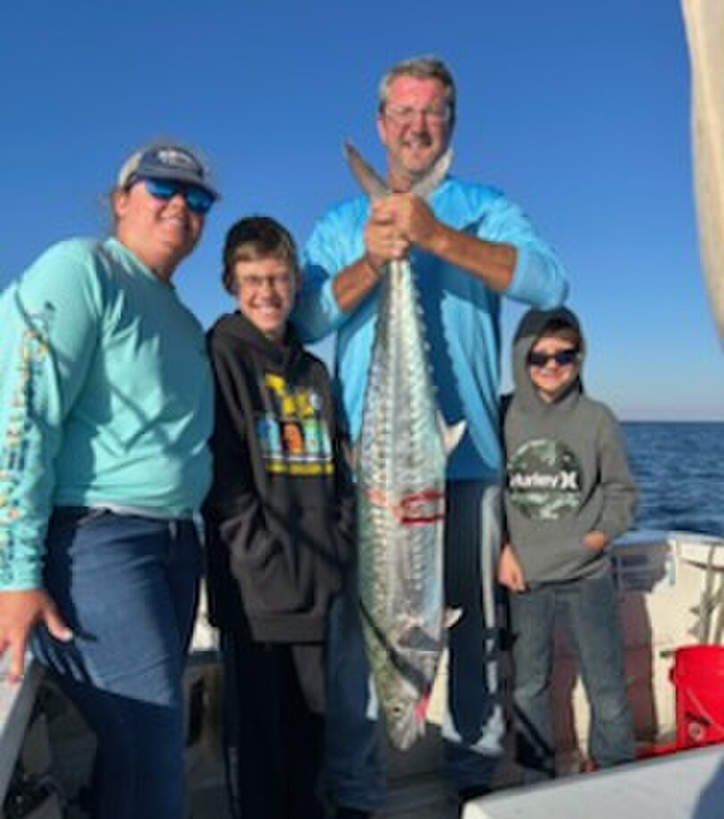 King mackerel fishing catch displayed on boat in Shalimar FL waters