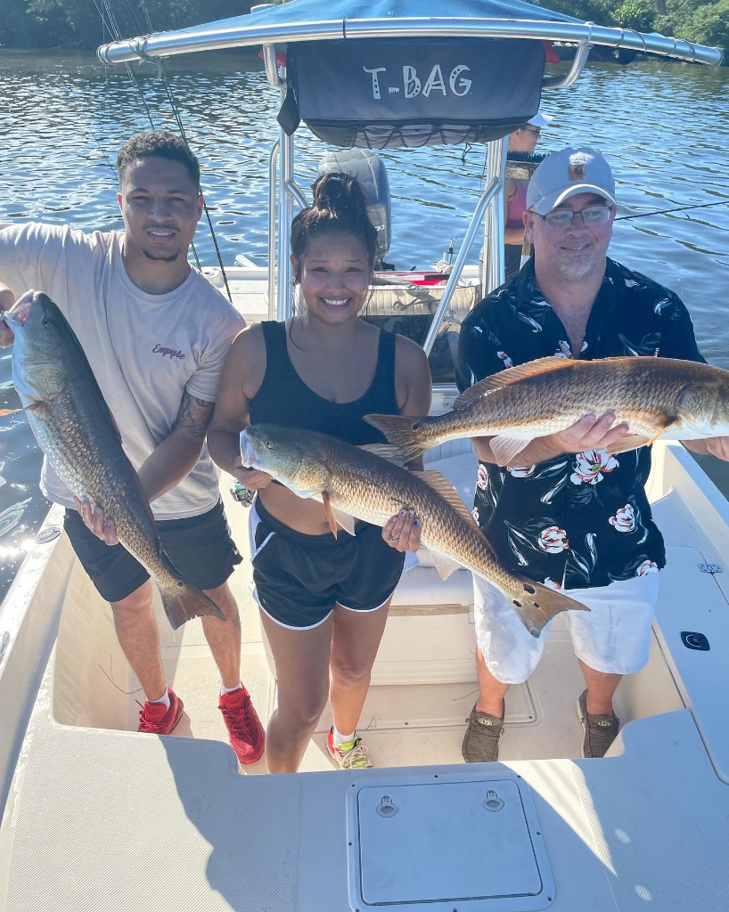Three redfish caught in Florida while fishing