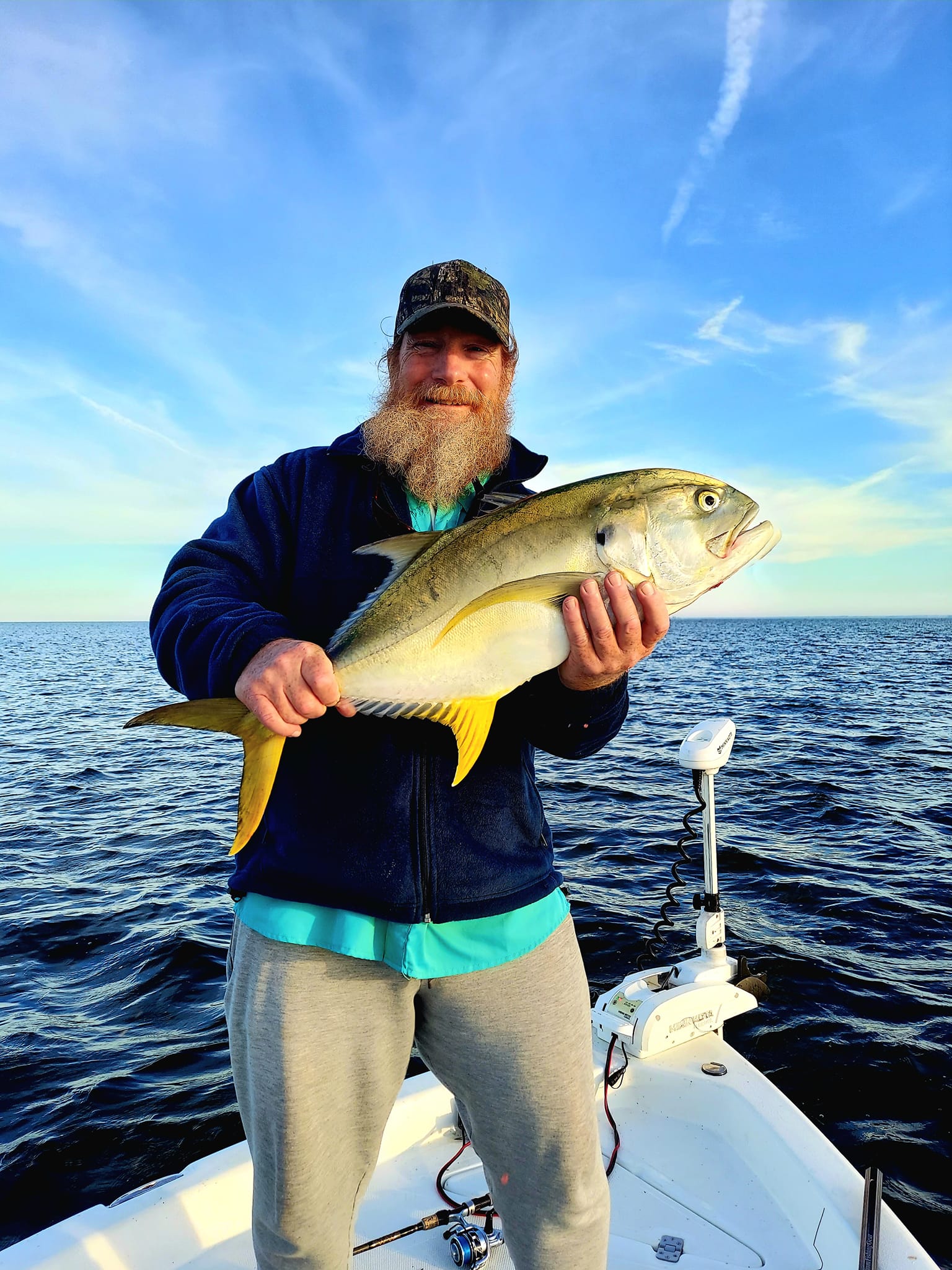 One fisherman with a catch in Crystal River