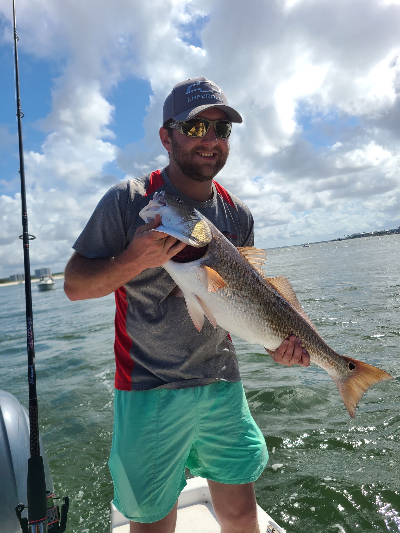 Fisherman with a catch in Orange Beach