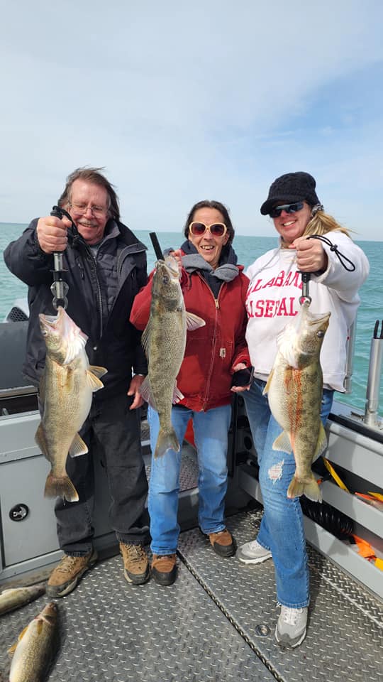 Three people fishing in Lorain