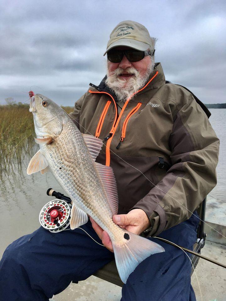 A person fishing in Apalachicola