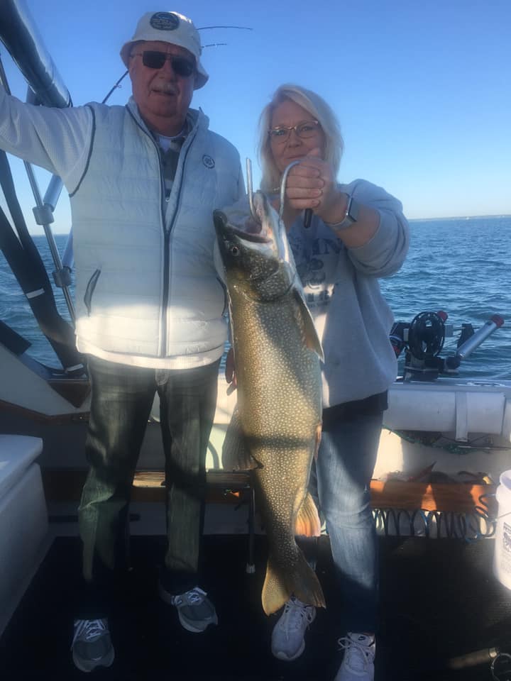 Image of two people fishing in IL