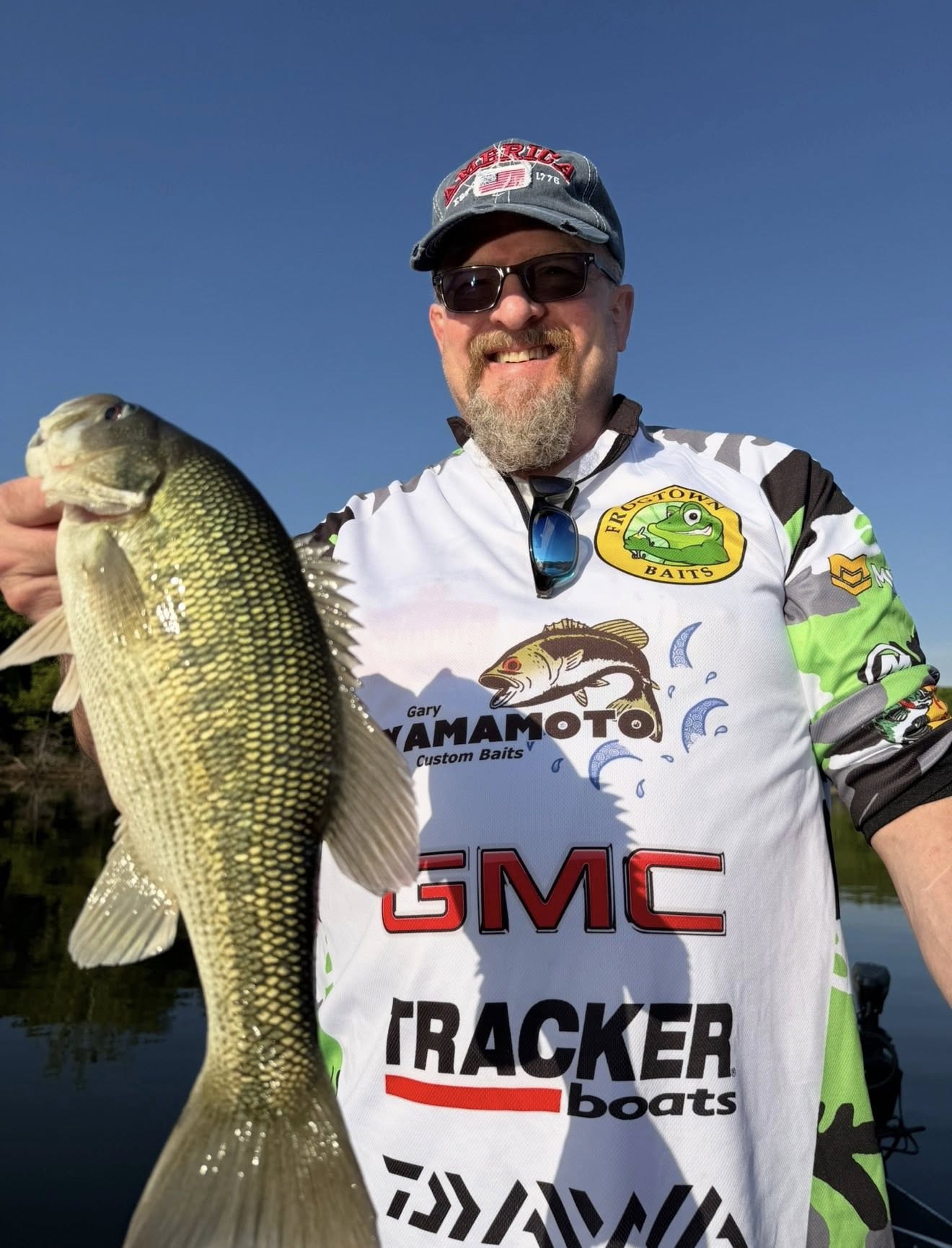 Spotted bass catch displayed on fishing boat in Branson MO