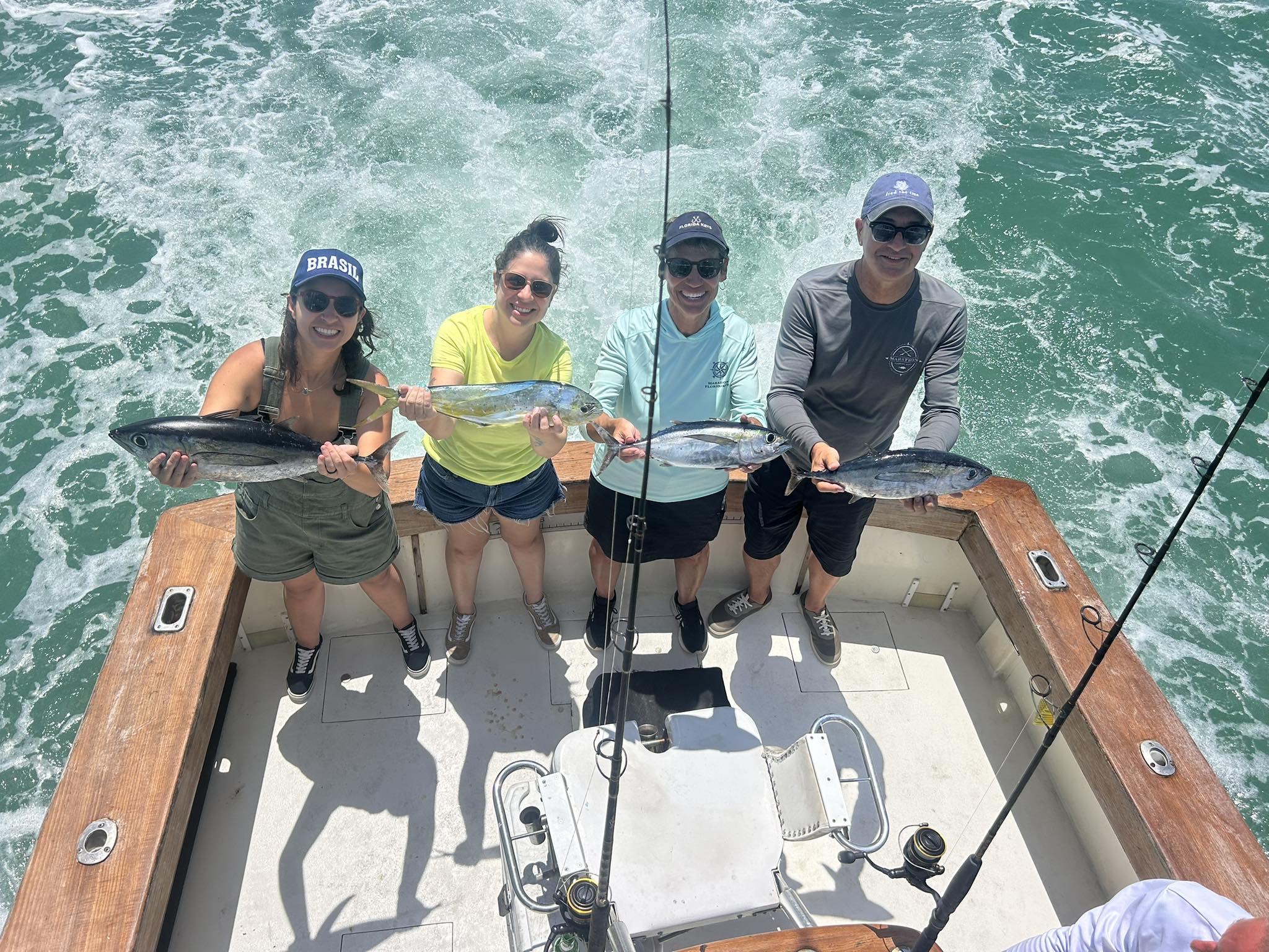 Two dogtooth tuna, 14 inches each, caught by 4 people fishing in Islamorada