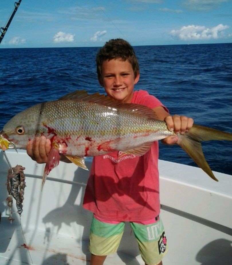 A person fishing at Pompano Beach