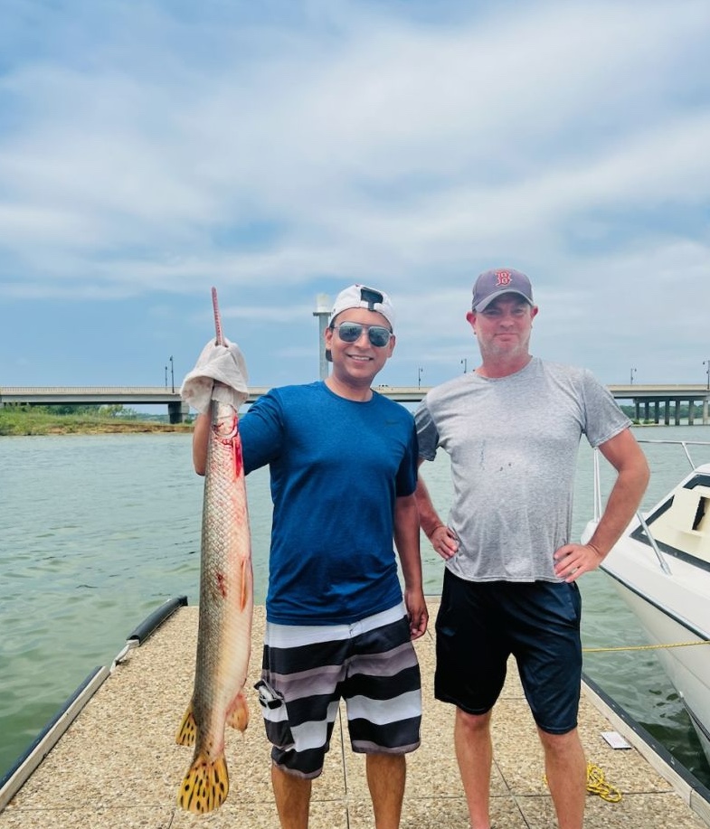 Two people fishing at Little Elm