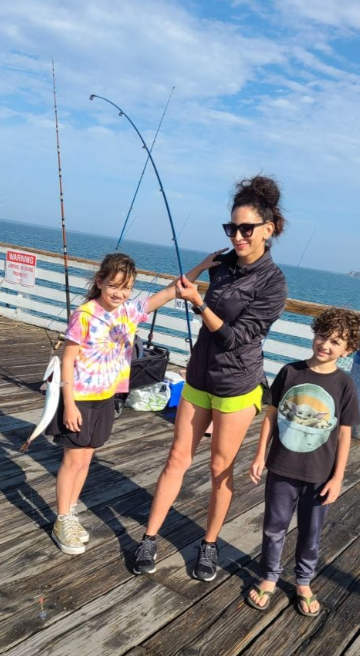 Three people fishing in San Diego