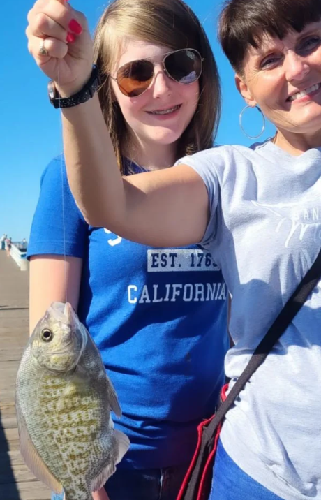 A couple enjoying a fishing trip in San Diego