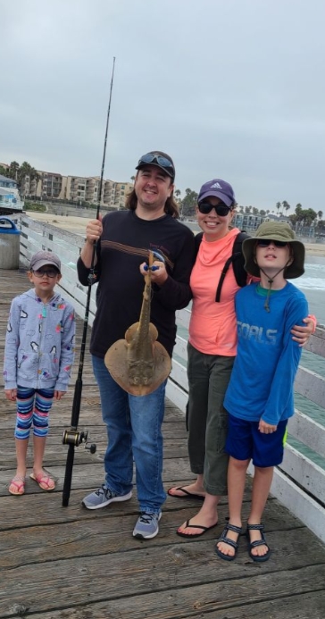Four people fishing in San Diego
