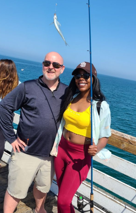 Two people enjoying fishing in San Diego