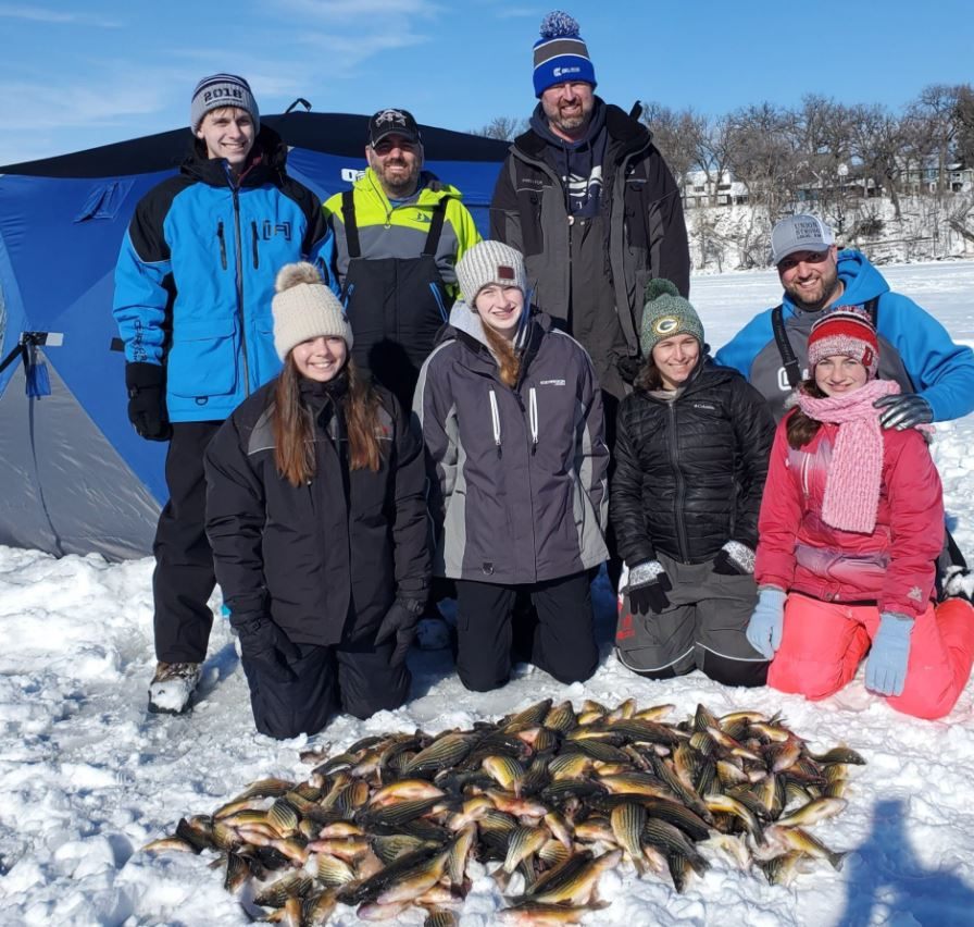 Eight people enjoying fishing in Iowa
