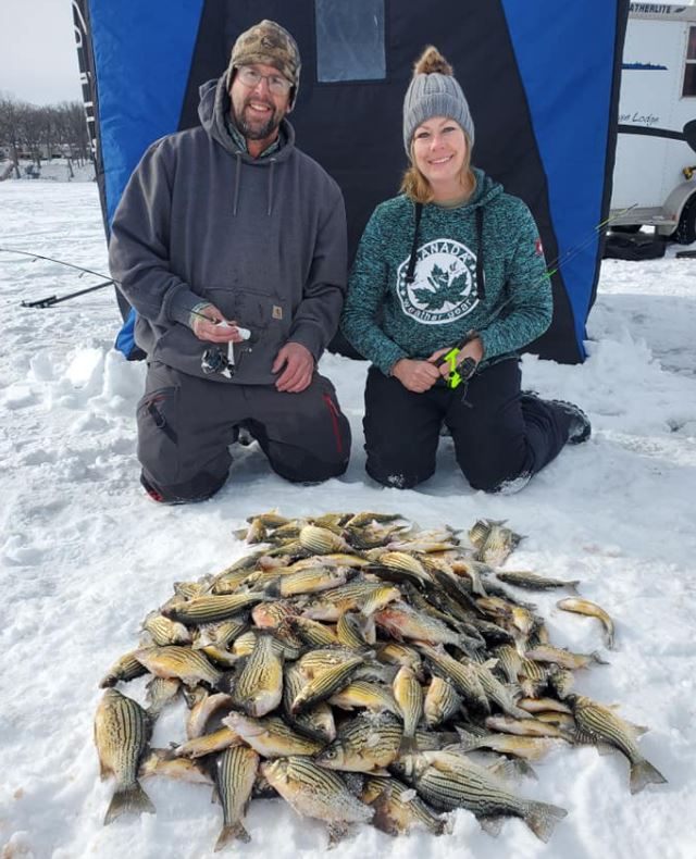Two people fishing in Iowa