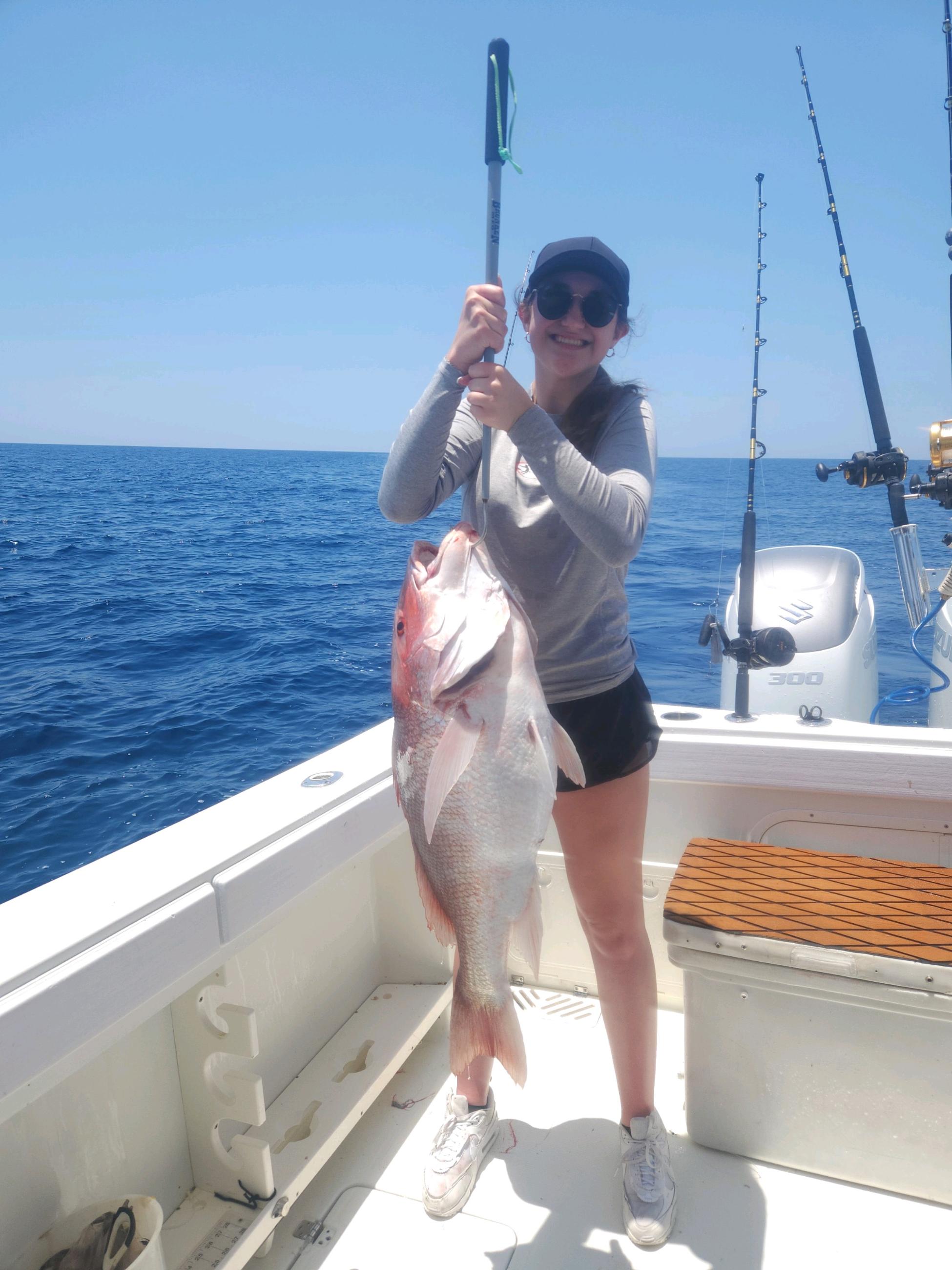 1 fisherman catching a 27-inch fish in Destin