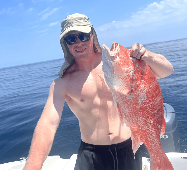 Angler holding a fish in Texas