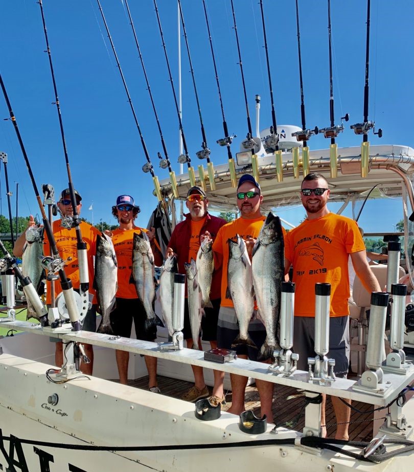 Successful fishing charter in Burt NY with multiple Chinook salmon caught on fishing boat
