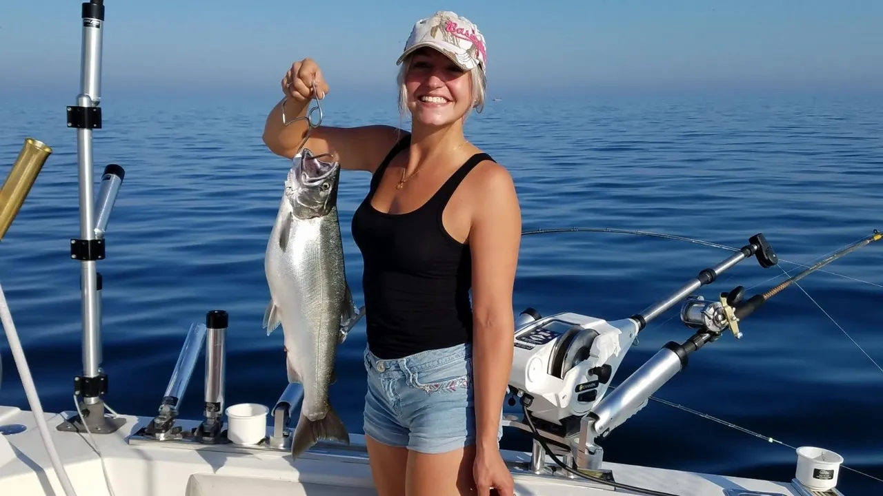 Two people fishing in Ludington