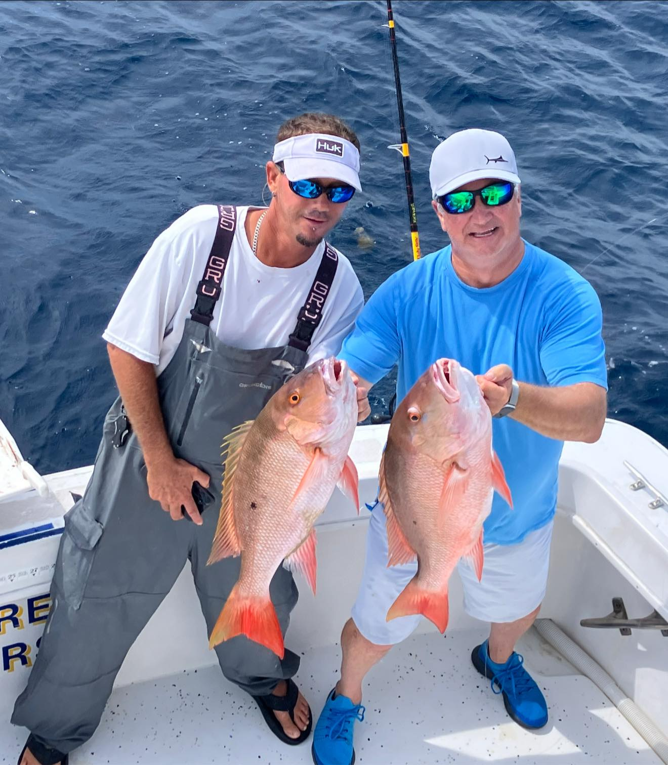 Two mutton snapper fish, 18 inches long, caught fishing in FL