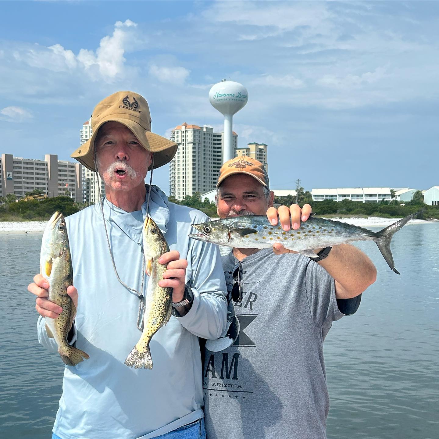 Three Spanish Mackerel, Spotted Weakfish, and Great Barracuda fish caught while fishing in Navarre
