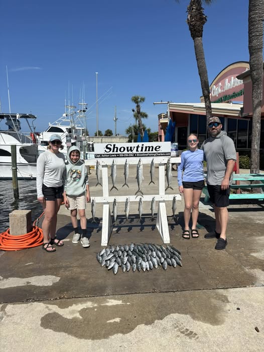 Fishing charter display board showing caught fish at Panama City Beach FL marina