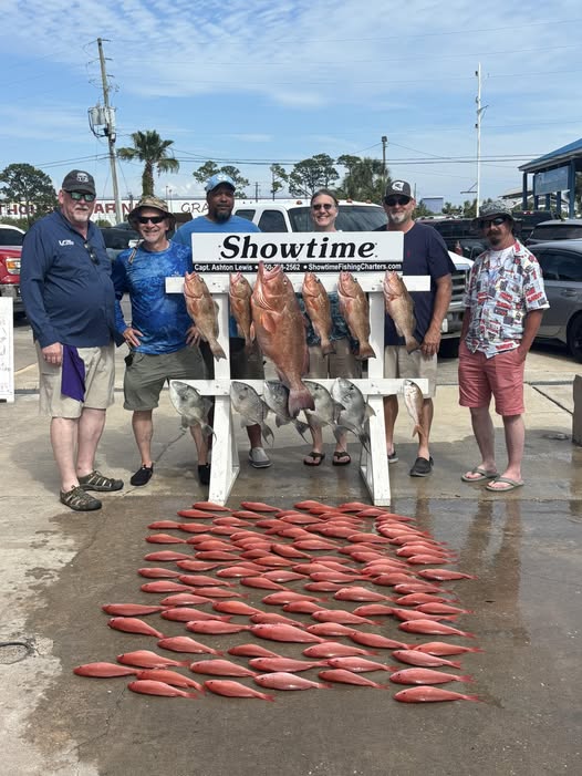 Successful fishing trip display with red snapper and grouper catch at Panama City Beach FL