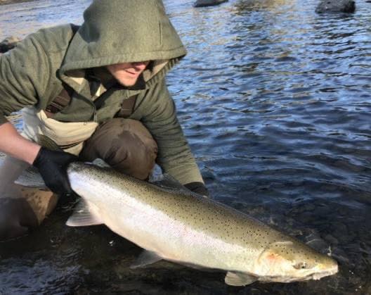 Lone angler fishing in AK