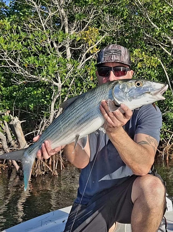 A person fishing in FL