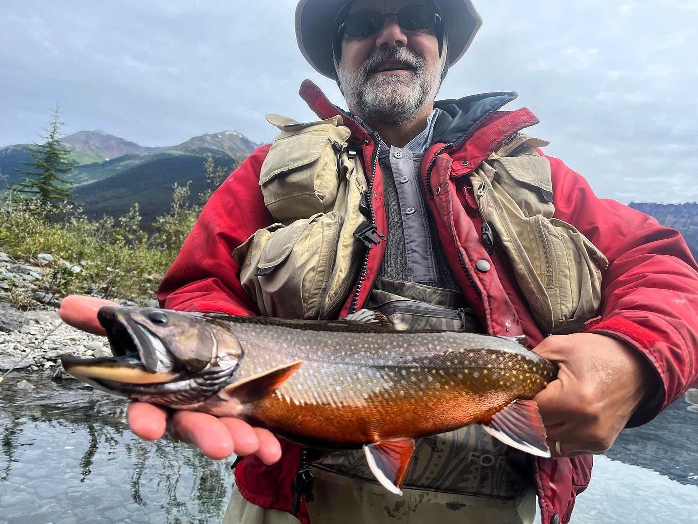 Angler with big fish at Fortress Lake