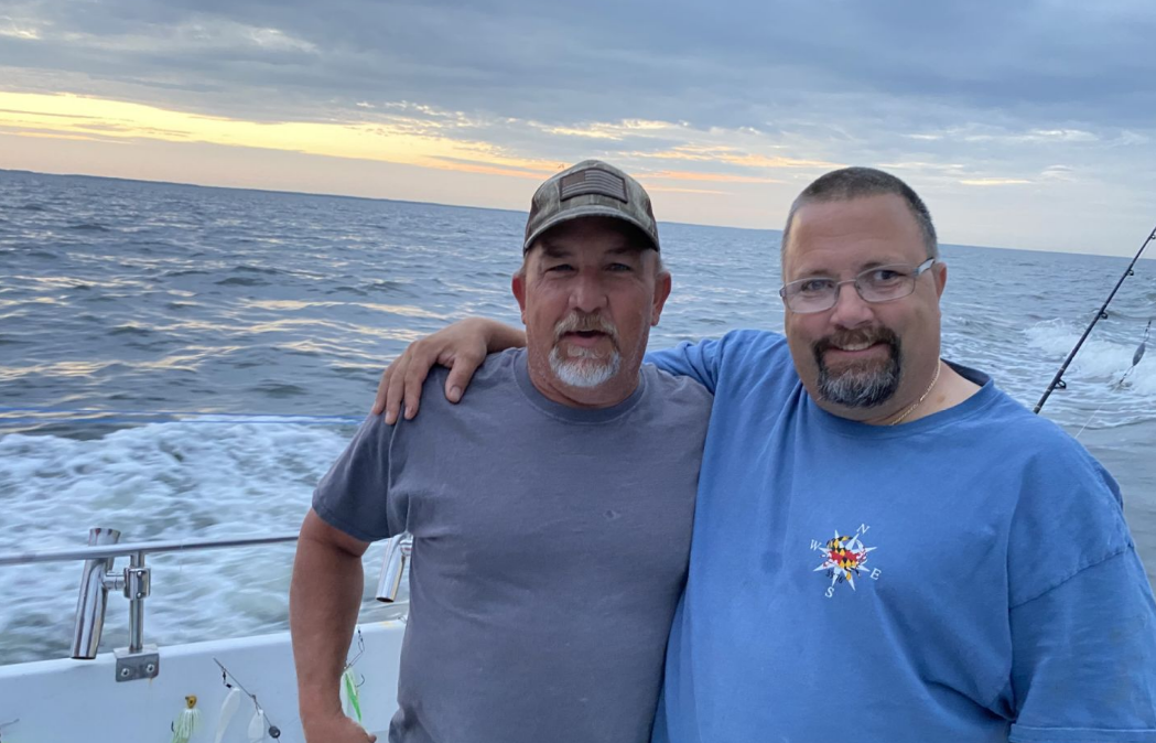 Two people fishing at Chesapeake Beach