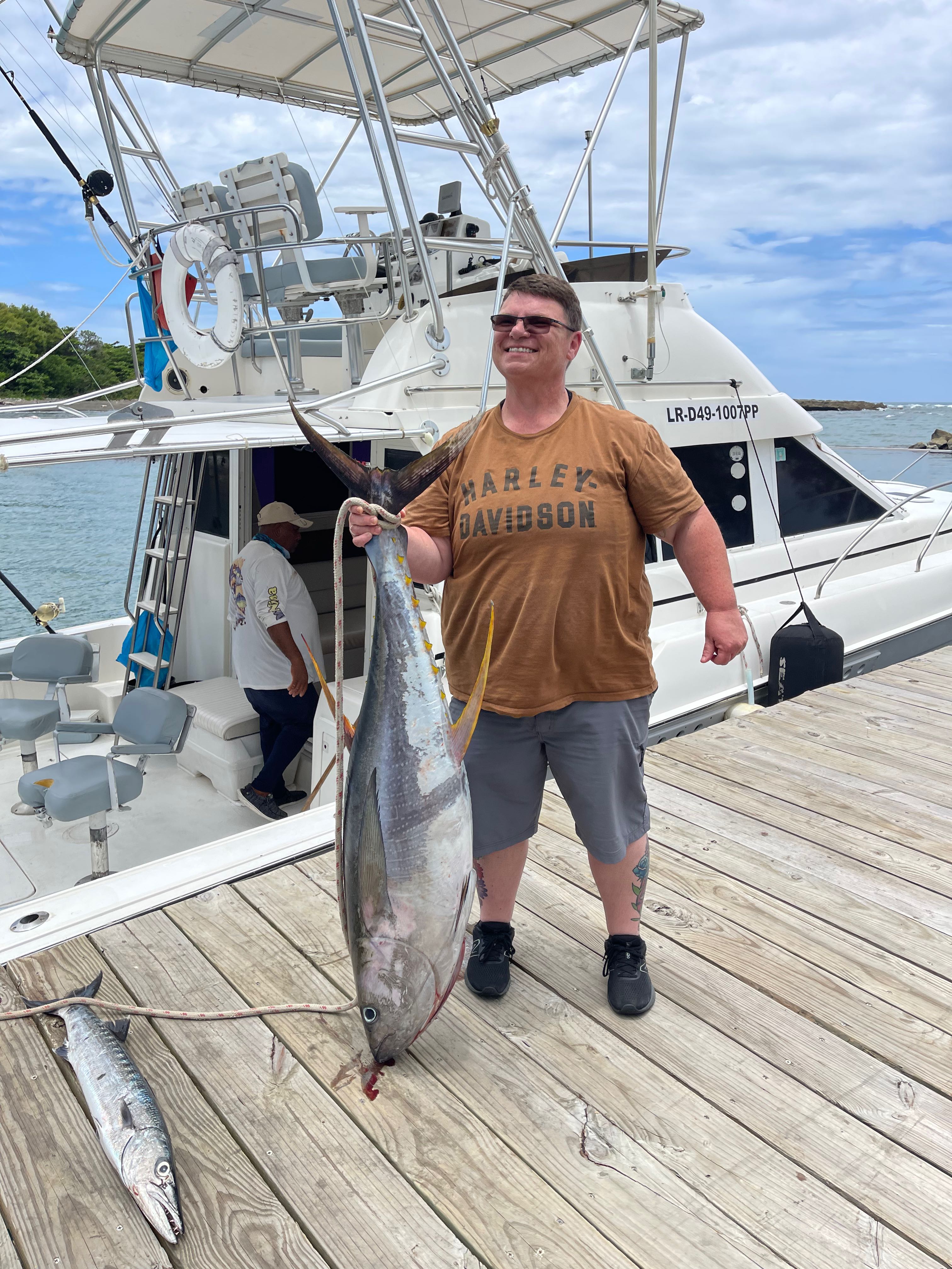 Yellowfin tuna catch displayed on fishing boat dock in Puerto Plata