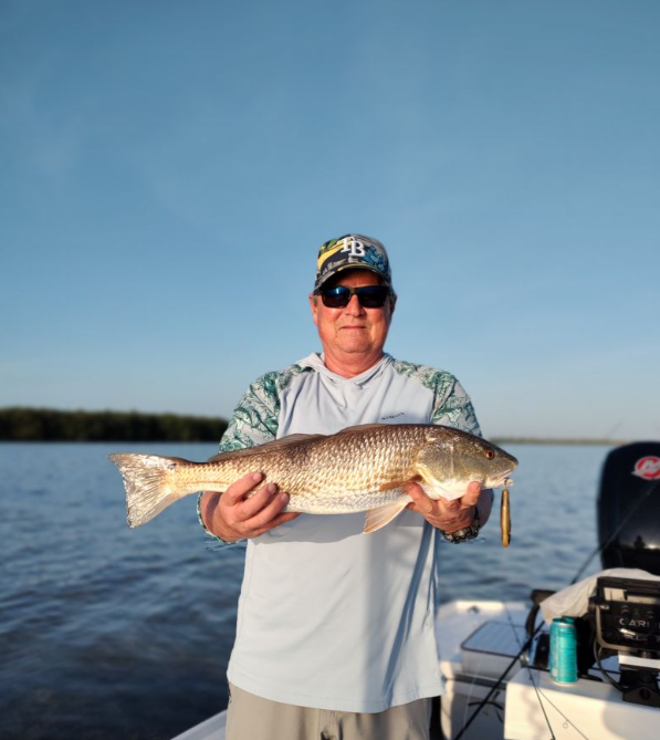 Angler with big fish in Belleair Bluffs