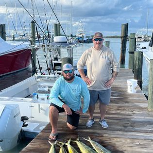 Two anglers fishing at Fort Pierce location