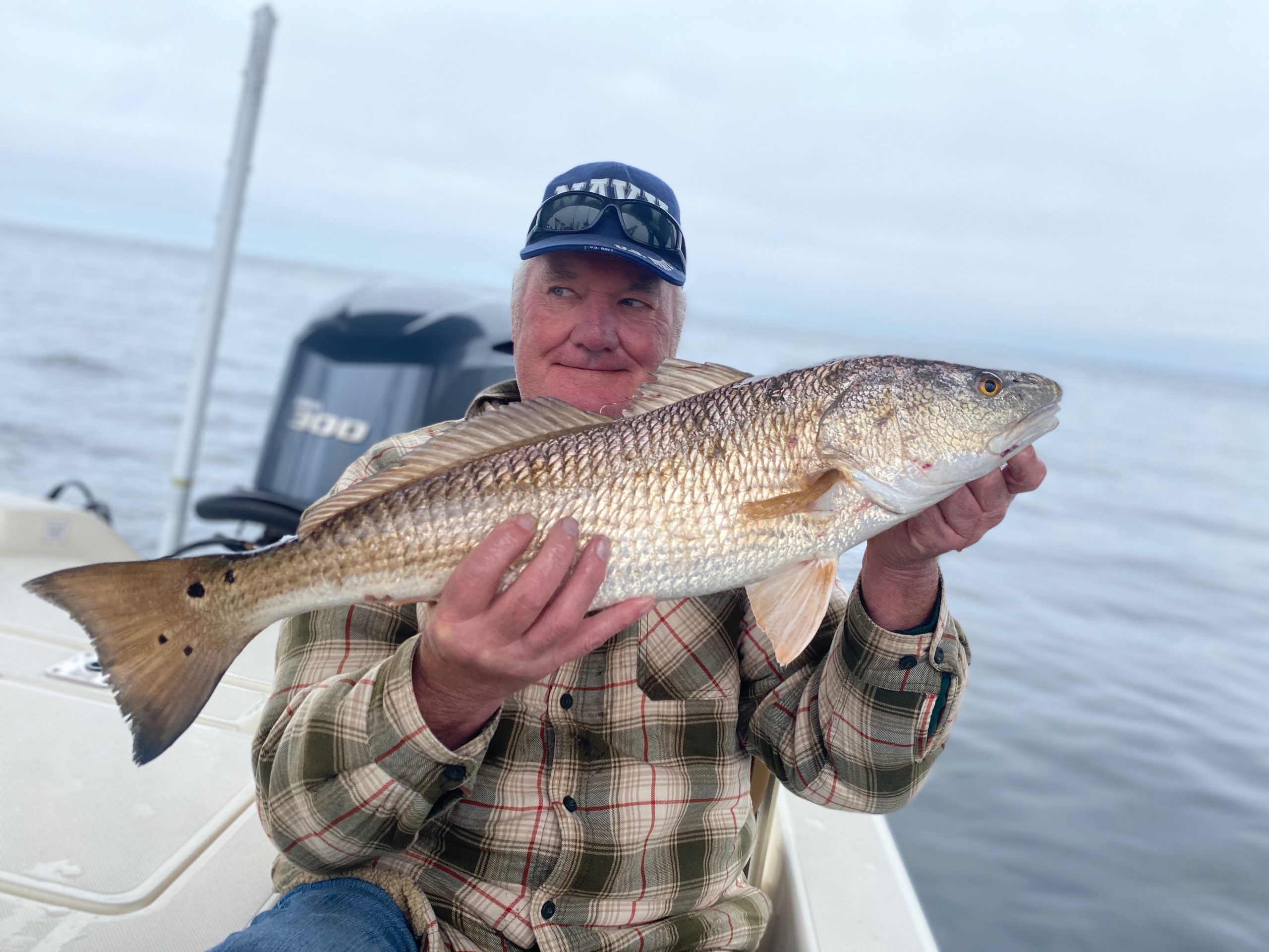 Photograph of a 28-inch redfish caught while fishing in FL