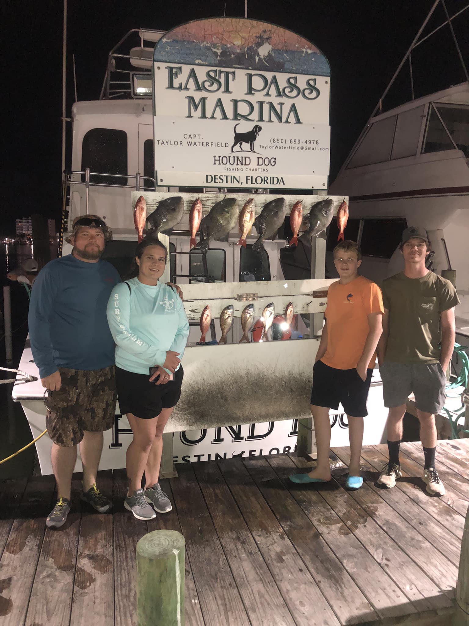 5 people enjoying fishing trip in Destin