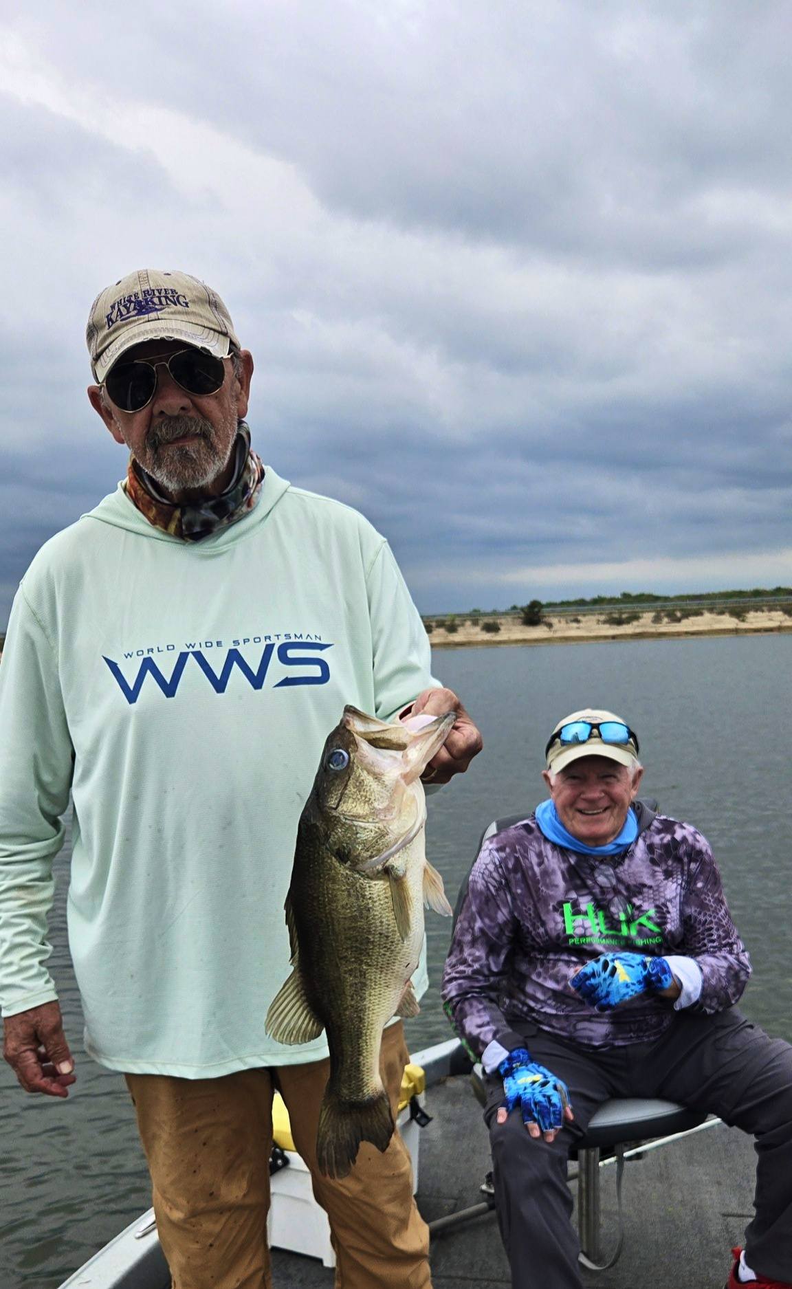 Freshly caught bass being held on fishing boat in Quitman TX