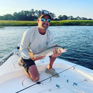 A fisherman enjoying a day of fishing in Savannah