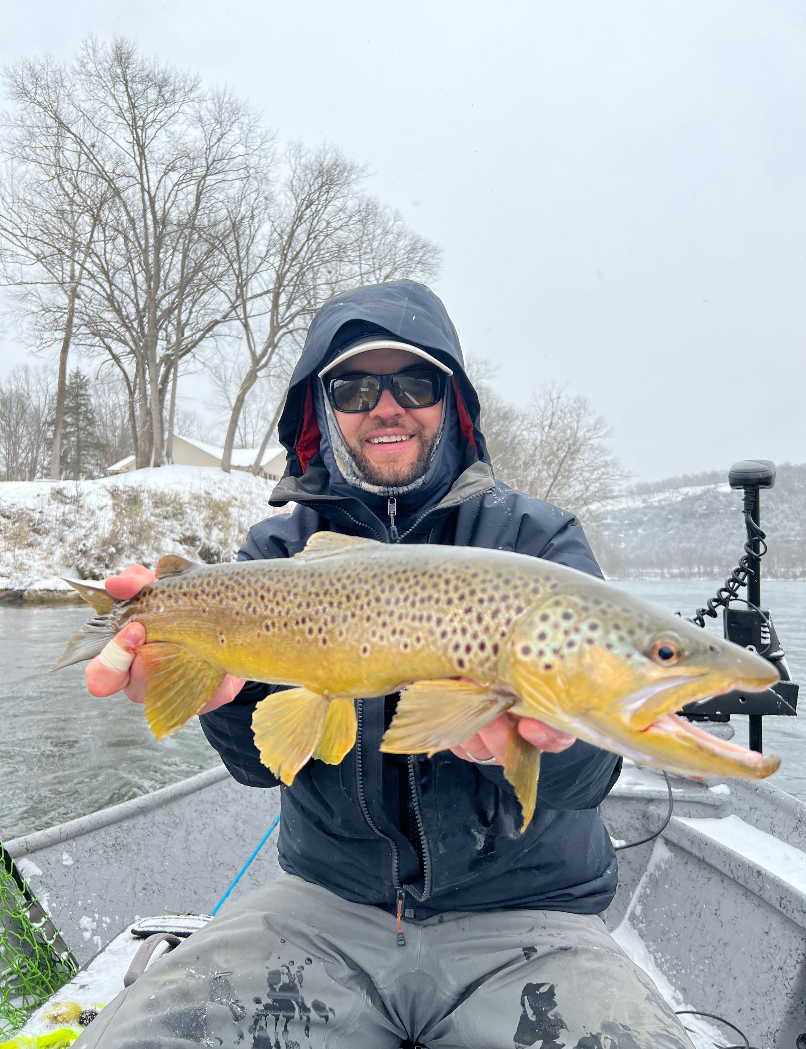 Angler with a sea trout catch in Traverse City