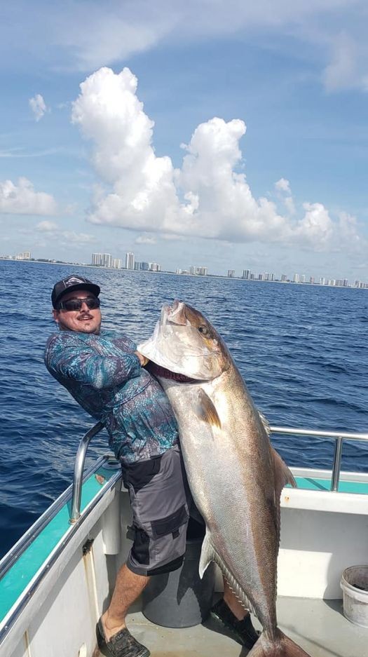 A lone angler fishing in the picturesque Miami Beach